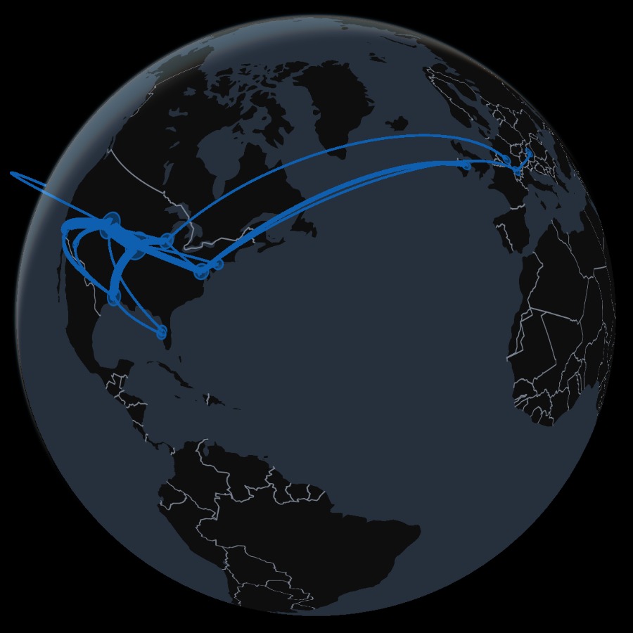 A globe showing real flight routes across North America and to Europe